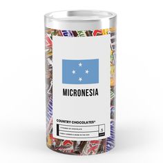 a can filled with lots of different colored candies next to a white background that says micronesiana country chocolates