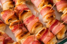 bacon wrapped skewers on a tray ready to be eaten