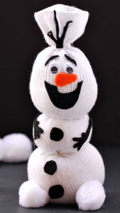 a snowman made out of knitted material