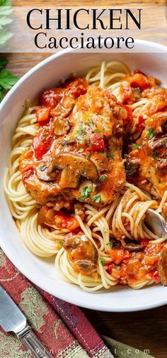 chicken cacciatore with spaghetti in a white bowl