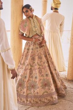 Beige and pink can can attached lehenga with cutdana embellished floral jaal embroidered motifs. Comes with padded embellished blouse and embellished gillet. - Aza Fashions Embellished Embroidered Fabric For Wedding, Semi-stitched Embellished Lehenga For Transitional Season, Embellished Anarkali Set For Transitional Season, Transitional Semi-stitched Embellished Lehenga, Zari Work Sets For Reception, Semi-stitched Raw Silk Gown, Embellished Lehenga For Transitional Season, Floor-length Embroidered Fabric For Festive Occasions, Transitional Designer Gown