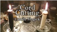 two candles sitting on top of a table with the words cord cutting candle magic in front of them