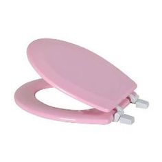 a pink toilet seat with two white handles