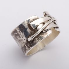 This "Koji" silver ring is handmade in 925 Sterling Silver in my workshop. The ring is hand crafted using a 92.5% pure silver flat piece, bent to shape, soldered, hammered and oxidized to give that special finish.The finish of this ring is inspired by the "Mokume-gane" distinctive pattern found on japanese swords.Materials: 92.5% pure solid silverBand width: 1/2 inch (1.3 cm)Ring size: 9 (This is a unique creation. Because of the special finish, it cannot be reproduced or resized. Only one size Wax Tutorial, Japanese Swords, Mens Silver Jewelry, Mokume Gane, Silver Flats, Men Jewelry, Mens Silver Rings, Lost Wax, Brass Jewelry