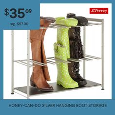 two pairs of boots are sitting on a shelf with the price tag $ 35 99