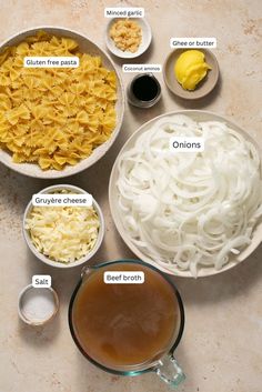 ingredients to make macaroni and cheese are shown in bowls