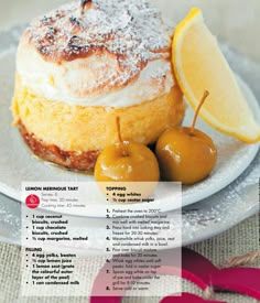 an advertisement for lemon meringue tart on a plate with cherries and powdered sugar