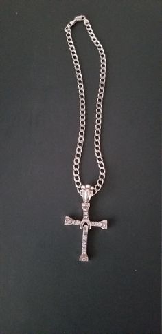 "Sterling 925 Silver Cross/Pendent with 925 Sterling Chain. A very beautiful Estate find. I don't know if the diamonds are real but they sure do look like it, Maybe Cubic Zirconia. It has a very nice large Bale 3/4\" The Cross has movable arms and a movable bottom. See Photos. I don't know the true age of it as it was an estate find. If you have any questions please Convo me  It is important for me to have satisfied customers.  You never know what you will find in my store  As always, Thank you for looking into ABlastInThePastVintg" Silver Diamond Cross Pendant Jewelry, Silver Cross Pendant Necklace With Box Chain, Silver Cuban Link Bling Necklace, Silver Cross Pendant Chain Jewelry, Silver Cross Pendant Necklace With Diamond Accents, Silver Iced Out Necklace For Anniversary, Sterling Silver Cuban Link Necklace With Bling, Sterling Silver Cuban Link Necklace In Diamond White, Silver Cross Diamond Jewelry