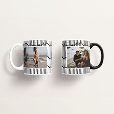 two black and white coffee mugs sitting next to each other