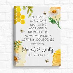 a white canvas with yellow flowers and bees on it that reads 50 years, bee days,