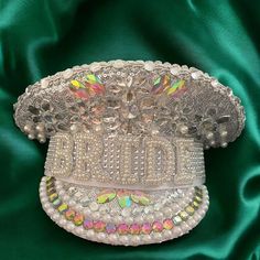 Are you ready to make a dazzling statement at your next event?  Introducing the Sequin Burning Silver Bride Military Hat, a unique accessory that combines the charm of a sailor captain's hat with the sparkle of sequins. Handcrafted with meticulous attention to detail, this hat is perfect for birthdays, festivals, or any occasion where you want to stand out. Available in a variety of colors, this hat is designed to elevate your outfit while showcasing your individuality. Features & Benefits - Handmade Craftsmanship     Each hat is carefully crafted by skilled artisans, ensuring a high-quality product that stands out. This attention to detail means you receive a unique piece that is both stylish and durable. - Sequin Burning Material     The shimmering sequins catch the light beautifully, ma Gowns Reception, Skull Artwork Illustrations, Different Hat Styles, Creative Hats, Bachelorette Party Hat, Bride Hats, Hen Do Ideas, Sequin Hat, Clothing Tape