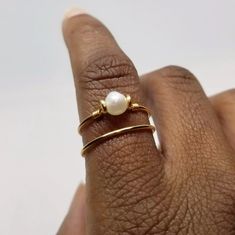 Freshwater Pearl Gold Wire Ring | Etsy Dainty Handmade Pearl Open Ring, Adjustable Gold Pearl Drop Ring, Dainty Adjustable Gold Pearl Ring, Gold Adjustable Pearl Drop Ring, Adjustable Gold Stackable Pearl Ring, Dainty Handmade Adjustable Pearl Ring, Adjustable Stackable Gold Pearl Ring, Wire Pearl Ring, Adjustable Wire Wrapped Pearl Ring