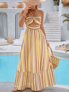 Summertime Dream: Sleeveless Striped Floral Vacation Dress with Neck H Striped Maxi Dress For The Beach, Striped Maxi Dress With Vertical Stripes For The Beach, Striped Beachwear Dress For Beach Season, Sleeveless Striped Vacation Dresses, Striped Sleeveless Vacation Dresses, Chic Maxi Dress With Vertical Stripes For Vacation, Sleeveless Vertical Striped Summer Dresses, Yellow Halter Neck Sleeveless Dress For Vacation, Casual Striped Maxi Dress For The Beach