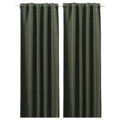 two dark green curtains hanging on a white wall