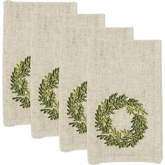 three napkins with green leaves on them and the word joy written in large letters