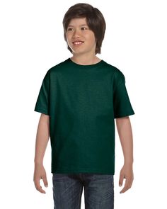 a young boy wearing a green t - shirt