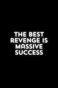 the best revenge is massive success in black and white text on a dark background