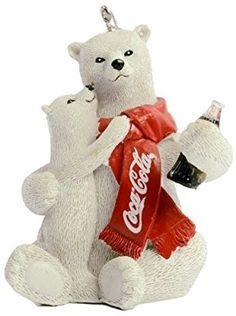 two white polar bears holding a bottle of coca - cola