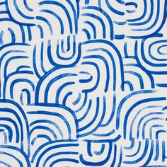 an abstract blue and white background with wavy lines in the shape of spirals or waves