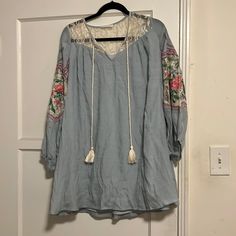 Loose Fitting And So Great To Dress Up Or Down! Beautiful Details. Made By A Great Designer Who I Own Tons Of Pieces From.., Just Getting Rid Of Ones I Don’t Wear. Size Small But Loose. Never Worn. Wrinkled From Storage. All Reasonable Offers Will Be Considered Blue V-neck Boho Dress For Spring, Blue Cotton Boho Dress For Summer, Light Blue Floral Embroidery Dress For Vacation, Light Blue Floral Embroidered Dress For Vacation, Blue Floral Embroidered Mini Dress For Vacation, Blue Cotton Long Sleeve Mini Dress, Blue Floral Embroidery Mini Dress For Vacation, Light Blue Embroidered Beach Dress, Blue Long Sleeve Cotton Mini Dress