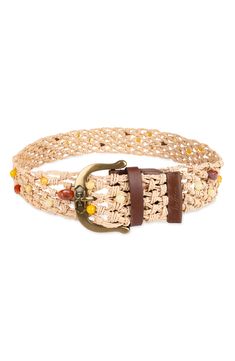 Add a flourishing touch to any look with this ornate belt knotted from raffia straw and embellished with multicolored beads and smooth leather trim. Raffia straw with leather trim Imported Beige Woven Belt For Vacation, Beige Woven Belts For Spring, Spring Beige Woven Belt, Adjustable Woven Belt For Summer, Adjustable Woven Beige Belt, Bohemian Adjustable Belt For Beach, Raffia Belt, Belt Knots, Leather Trim