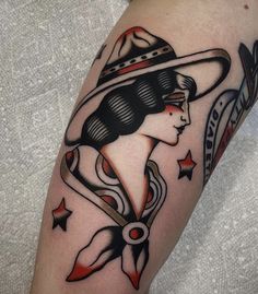 a woman with a hat and stars on her arm