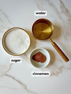 ingredients for making homemade sugar cookies on a marble counter top with words describing how to use them