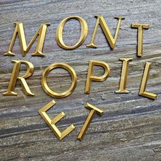 gold letters that spell out the word mount ropple