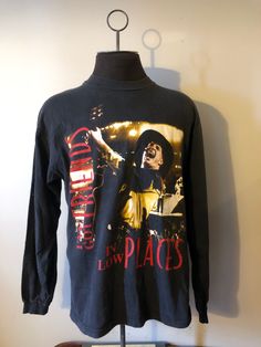 "Garth Brooks Long Sleeve  - Garth Brooks Live in concert graphic  - I've Got Friends In Low Places spell out  - Blame It All On My Roots spell out back  - Rare 90s vintage shirt  - Hanes tagged  - Distressing on graphic/vintage fade  Size: XL 23\" pit to pit  30\" shoulder to waist  21\" inseam sleeve  24\" top sleeve to cuff  Great vintage condition  No rips or holes  No stains" Vintage Graphic Tops For Fall, Vintage Top For Fall Concert, Vintage Tops For Fall Concert, Vintage Long Sleeve Tops For Concert, 90s Style Tops For Fall Concert, Vintage Logo Print Top For Concert, Garth Brooks Songs, Concert Graphic, Beer Hoodie