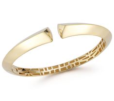 Elevate your style options with the Italian Gold knife edge bangle. This exquisite 14K yellow gold piece features a distinctive knife edge design, adding a touch of sophistication to any ensemble. From Italian Gold. Modern Yellow Gold Bangle With Polished Finish, Modern Yellow Gold Diamond Cut Bangle, Modern Gold Bangle Bracelet With Diamond Cut, Luxury Yellow Gold Open Band Bracelet, Yellow Gold Open Band Bracelet For Formal Occasions, Yellow Gold Open Band Bracelets For Formal Occasions, Formal Yellow Gold Open Band Bracelet, Modern Formal Bangle With Diamond Cut, Modern Diamond Cut Bangle For Formal Occasions