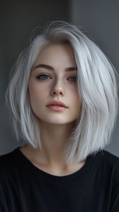 This modern textured bob is a fabulous style for anyone looking to combine elegance with a playful edge. The silver tones not only add a fresh and trendy vibe but also beautifully enhance the hair’s natural texture, creating depth and movement. To achieve this look, use a texturizing spray or mousse while styling; this will help amplify the bob’s layers, giving it that effortless, tousled appearance. Silver Hair Women, Grey Bob Hairstyles, Dark Fall Hair Colors, Dark Fall Hair, Grey Bob, Fabulous Style, Colour Hair, Textured Bob, Timeless Looks