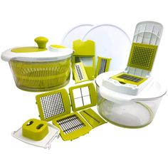 the green and white kitchen accessories are arranged together