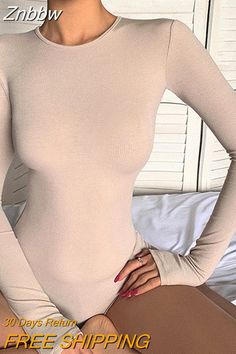 Seamless Stretch Bodysuit For Club, Solid Color Stretch Backless Leotard, Stretch Beige Bodysuit For Night Out, Beige Stretch Bodysuit For Night Out, Beige One-piece Bodysuit For Party, Solid Bodycon Bodysuit For Club, High Stretch Leotard For Club, High Stretch Club Leotard, Beige Sleeveless Bodysuit For Party