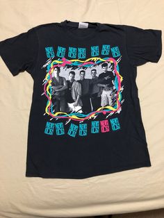 "This is an authentic New Kids On The Block concert t-shirt (not a modern reproduction) from the 1989 tour. Size men's medium, Pit-To Pit is 18\" and Collar-To-Hem is 26\". Hanes brand, 100% cotton. 80s fashion ** SHIPPING: I can ship the item via UPS Ground, which is far more cost effective than USPS Priority Mail Express. I do not use standard USPS Priority Mail because it is not guaranteed to arrive on time and in the past I've had packages take 3 weeks to deliver. If you want UPS instead of USPS Priority Mail, MESSAGE ME BEFORE YOU BUY with your address. I can give you an exact price quote for UPS shipping and adjust the listing accordingly. Thanks." 1989 Concert, Nkotb Shirt, Nkotb Concert, 1989 Tour, Donnie Wahlberg, Concert T Shirt, New Kids On The Block, Kids On The Block, Fan Shirts