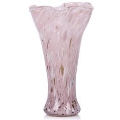 a pink vase sitting on top of a white table