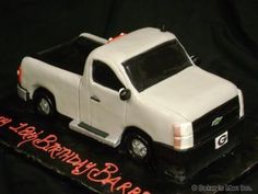 a birthday cake with a white truck on it