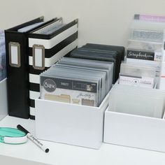 an office desk with many files and folders on it