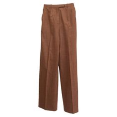 100% authentic Hermès high waisted pants in tan virgin wool (100%). Comes with two slit pockets on the side and two sewn shut slit pockets on the back. Opens with a concealed button, hook and zipper on the front. Have been worn and are in excellent condition. Measurements Tag Size 34 Size XXS Waist 58cm (22.6in) to 60cm (23.4in) Hips 80cm (31.2in) to 90cm (35.1in) Length 103cm (40.2in) All our listings include only the listed item unless otherwise specified in the description above. Brown Wool Pants, Brown Slacks, Khaki Slacks, Biker Pants, Riding Pants, Kelly Bag, Vintage Hermes, Brown Pants, Wool Trousers