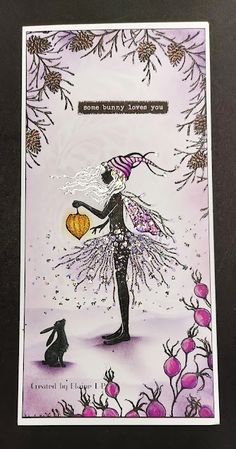 a card with an image of a fairy holding a pumpkin