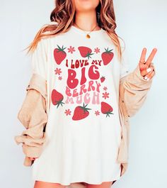 ✨ THE BIG LITTLE STRAWBERRY SHIRT - (LIL SIS) - COMFORT COLORS We cannot wait for you to get your hands on this strawberry inspired, big little reveal shirt! We have combined the cottage core vibe with the sorority style and we hope we did it justice and you love it! 😍 This is a perfect gift for any big/little sisters.  If you would like to discuss any alternative size, color or product options, please do not hesitate to contact us directly. 💌 ALSO AVAILABLE AS A 'BIG' TSHIRT: ➡️ ➡️ ➡️ https://www.etsy.com/listing/1564322324/little-comfort-colors-shirt ✨ ABOUT OUR COMFORT COLORS TEES ✨ These 100% ring-spun cotton unisex tees are a great staple for any wardrobe and available in various different colours. The soft-washed, garment-dyed fabric brings extra coziness to your wardrobe while the Pre-shrunk Sorority T-shirt With Crew Neck, White Crew Neck Sorority T-shirt, Cute Oversized T-shirt With Funny Print, Spring Sorority Cotton T-shirt, Sorority Cotton T-shirt For Spring, Sorority Style Cotton T-shirt For Spring, Cotton Sorority Top With Text Print, White Sorority Graphic Print T-shirt, Sorority Relaxed Fit Graphic Print Tops