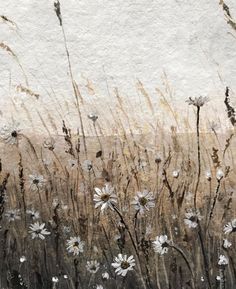 a painting of flowers and grass on a wall