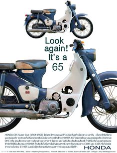 a blue and white motorcycle with the words look again, it's a 65