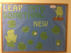 a bulletin board that says leap into something new with frogs and froggies on it