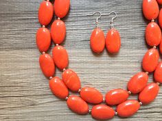 "Bright & fun Orange statement necklace! 16\" necklace with a 4\" extender chain. Thank you for supporting American small business :) *Smoke and pet free home!* I ship 6 days a week! Thank you for browsing my store, Check out my other items!" Orange Oval Beaded Necklaces As Gifts, Orange Oval Beaded Necklace For Gifting, Orange Oval Beaded Necklace For Gift, Orange Oval Beads For Jewelry Making, Orange Beaded Necklace, Orange Statement Necklace, Fall Necklace, Spring Necklace, Neutral Jewelry