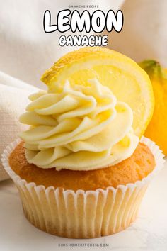 there is a cupcake with lemon on top