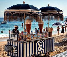 an ice cream stand on the beach with umbrellas over it and people in the water