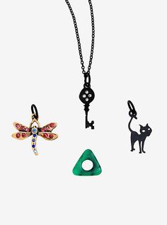 three different types of necklaces on a white background, one with a dragonfly and the other with a cat