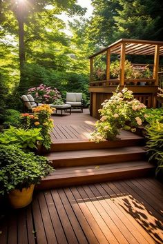 a wooden deck surrounded by lots of plants and flowers in the sunlit forest area