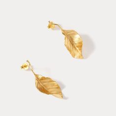 Embrace the seasonal melody with our Autumn Leaves Earrings, these earrings capture the essence of fall, where leaves transform into a vibrant tapestry of warm hues. Adorning yourself with these earrings is akin to carrying a harmonious tune of nature's beauty, a visual ode to the fleeting yet enchanting moments of autumn. DETAILS Plating:  18k Gold  Materials:  18k Gold on 925 Silver Size: 1.42"* 0.51 "(3.6cm* 1.3 cm) Weight:  4.0g/pr Yellow Gold Leaf Earrings, Yellow Gold Leaf-shaped Earrings For Pierced Ears, Nature-inspired Yellow Gold Drop Earrings, Gold Leaf-shaped Nature-inspired Earrings, Nature-inspired Gold Leaf Earrings, Yellow Gold Nature-inspired Drop Earrings, Gold Leaf Nature-inspired Earrings, Nature-inspired Gold Leaf-shaped Earrings, Autumn Details