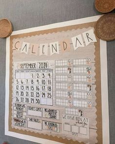 a calendar is hanging on the wall